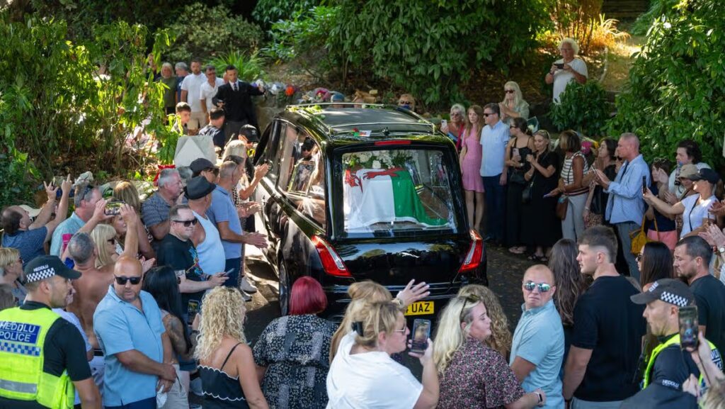 Bonnie Tyler’s coffin driven home through Mumbles to rapturous applause as thousands line the streets