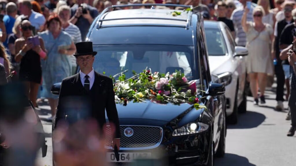 Bonnie Tyler fans line streets and sing Total Eclipse of the Heart ahead of funeral