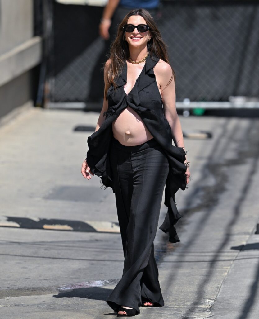 “Anne Hathaway showed off her very real bump in LA” links