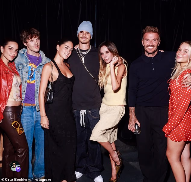 Cruz Beckham takes a fresh jibe at Brooklyn as he shares cosy family snap from his show at Leeds Festival – just hours after his estranged brother supported his wife Nicola Peltz after her Venice Film Festival debut