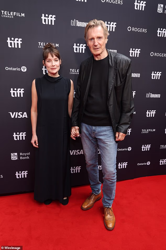 Liam Neeson, 74, sparks dating rumors after holding hands with younger co-star at TIFF screening