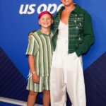 Pink is seen for the first time since Macklemore row as her son Jameson, 9, shows off bright pink hair at the US Open men’s final