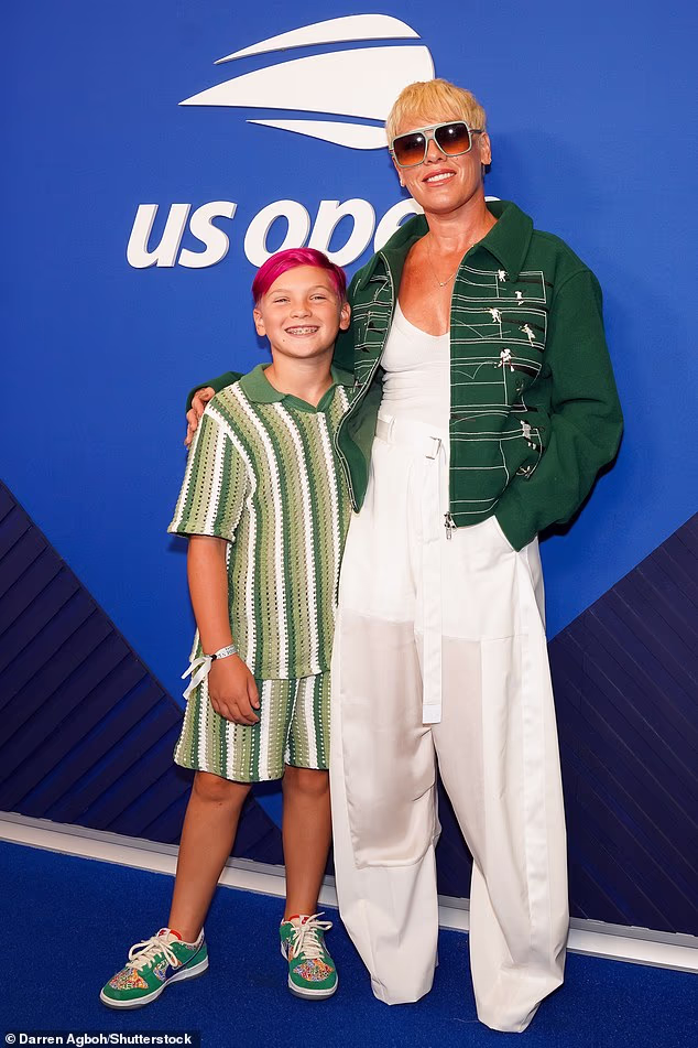 Pink is seen for the first time since Macklemore row as her son Jameson, 9, shows off bright pink hair at the US Open men’s final