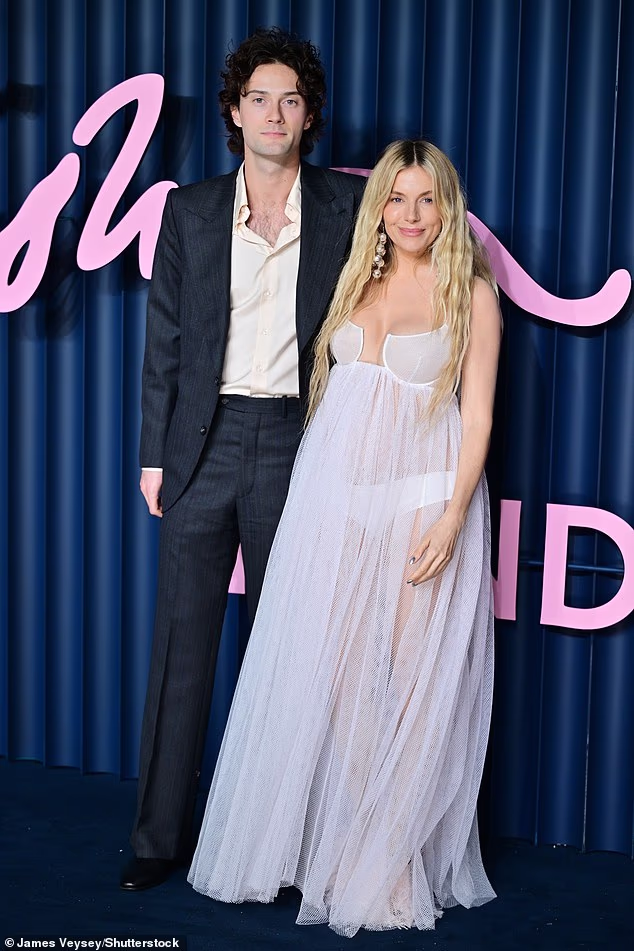 Sienna Miller reveals fiancé Oli Green proposed to her during a walk in Central Park when she had greasy hair and a stained T-shirt shortly after giving birth to their second child