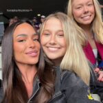 Brisbane Lions’ newest WAG Emma Field shows her support for boyfriend Lachie Neale as she wears his name emblazoned across her back at 2026 AFL Grand Final