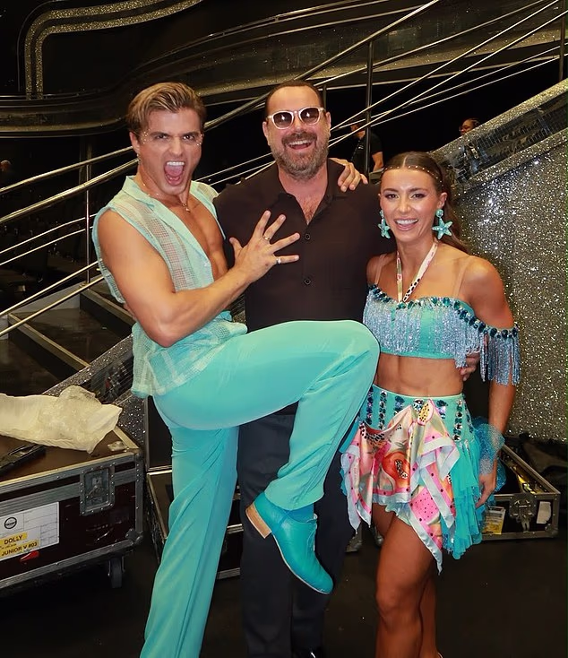 Dani Dyer is supported by her dad Danny at the first Strictly live show as he poses in hilarious snap with her pro partner Nikita Kuzmin