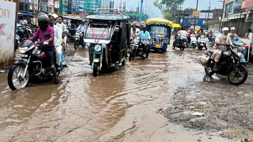 Bhopal’s Rain-Battered Roads Turn Risky; Bikers Fall, Cars Get Stuck In Water-Filled Potholes