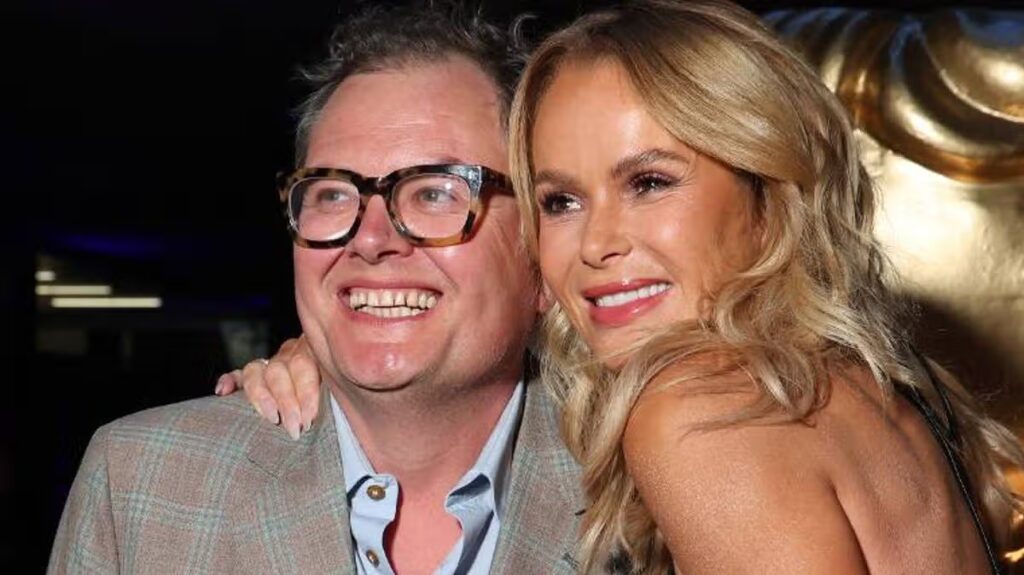 Alan Carr brands Amanda Holden a ‘little b***h’ after surprise musical number at NTAs