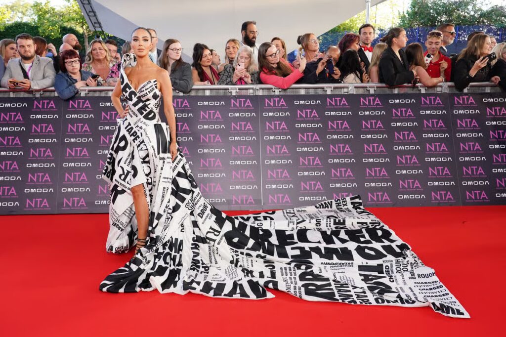 N-Dubz’ Tulisa struts down red carpet in dress of drug sting headlines
