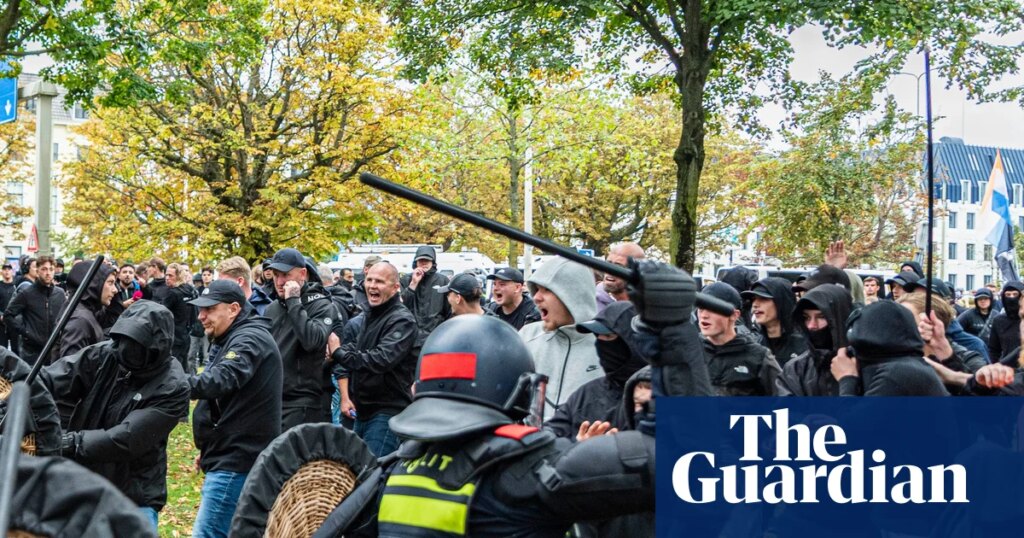 Dutch riot police break up far-right protest in The Hague after violence erupts | Netherlands