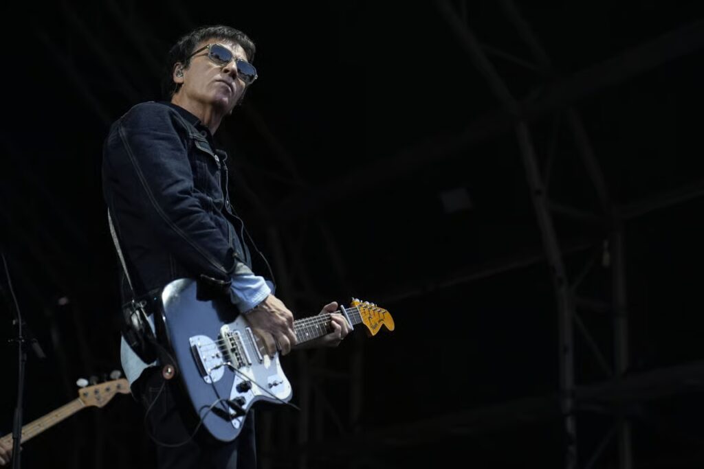 Two Johnny Marr guitars have sold for more than half a million pounds