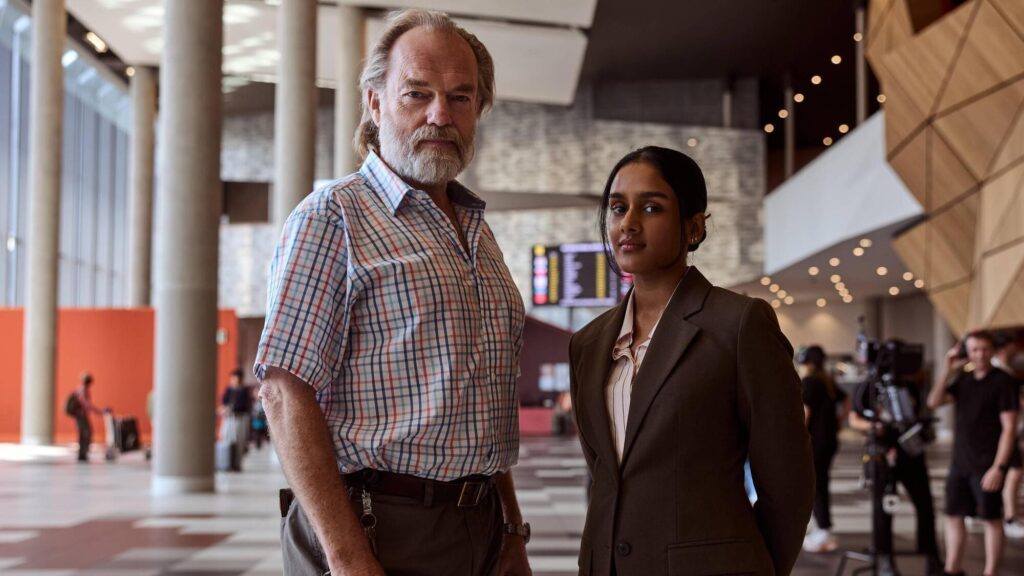 ‘There’s a bit of Irish spoken’: Hugo Weaving on playing an airport chaplain