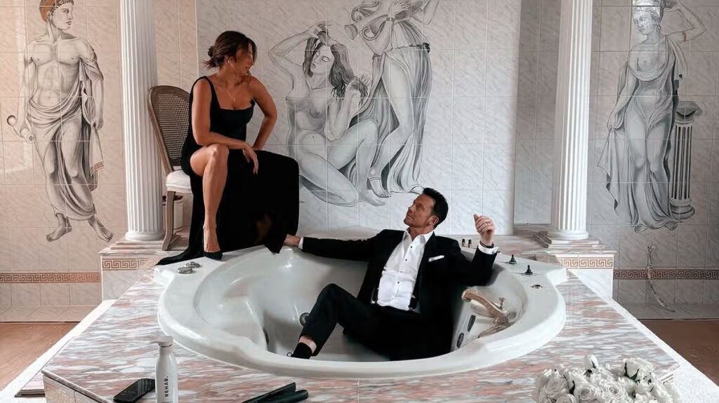 Stacey Solomon and Joe Swash pose in their huge ‘Scarface bathroom’ in NTA outfits