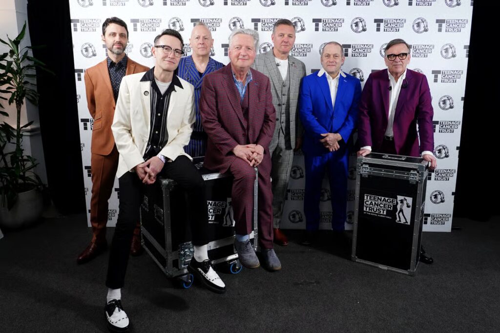 Rock band Squeeze cancel show after worker crushed to death under tour bus