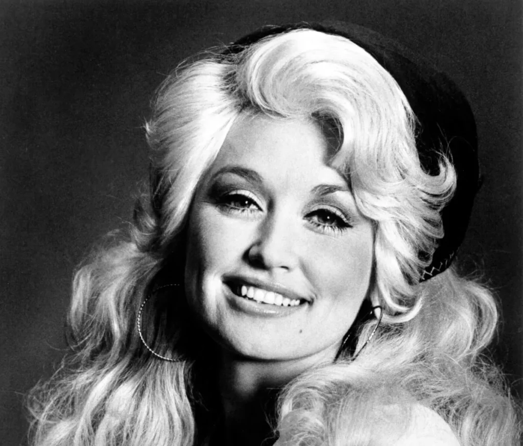 Dolly Parton Was ‘Scared to Death’ About Curtsying to Queen Elizabeth — and the Queen Was ‘Very Sweet’ About It 