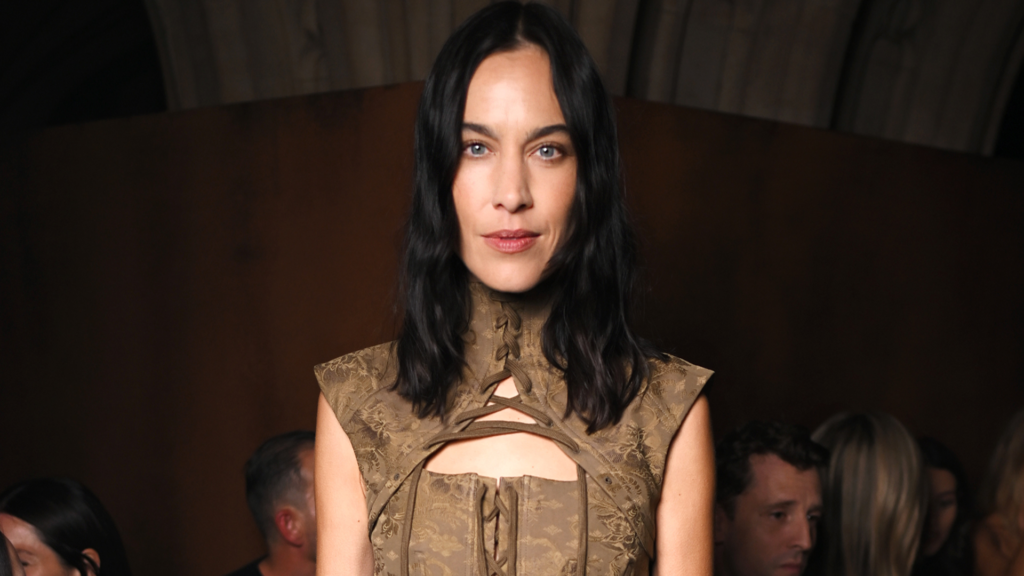 Alexa Chung Styles a Corset With Trousers at McQueen Show