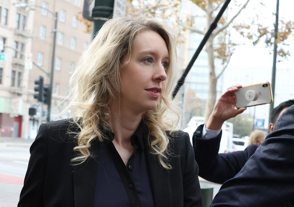 Blood In. Blood Out. Elizabeth Holmes Has Been Approved To Leave Prison. But How Much Of Her Former Multi-Billion-Dollar Net Worth Remains?