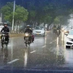 Karachi wakes up under dark, rainy skies