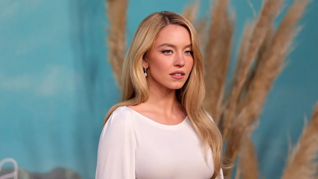 Sydney Sweeney sports ‘SB’ necklace in new Syrn lingerie campaign