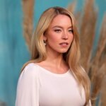 Sydney Sweeney sports ‘SB’ necklace in new Syrn lingerie campaign