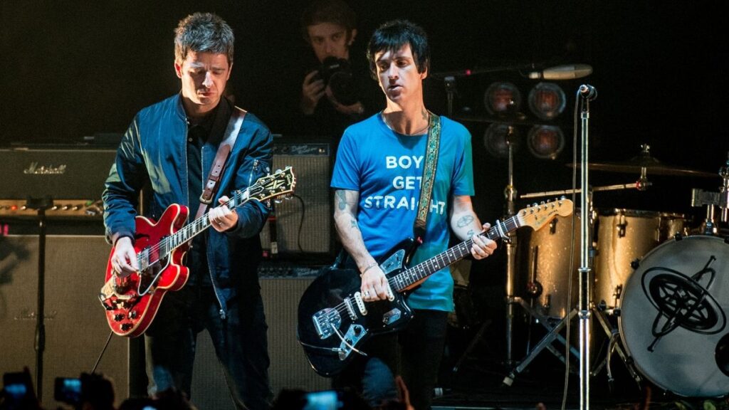 “I remember looking at it on the floor going, ‘That can not be The Smiths’ guitar’”: The Johnny Marr guitar hidden in an iconic Oasis photoshoot