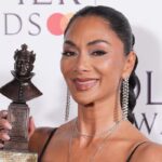 Nicole Scherzinger performs with large burn after being scalded by boiling water