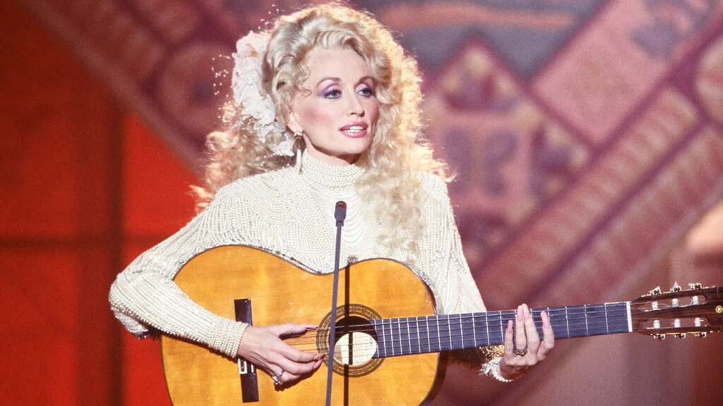 Dolly Parton hid cancer diagnosis to keep fans from worrying, sister says