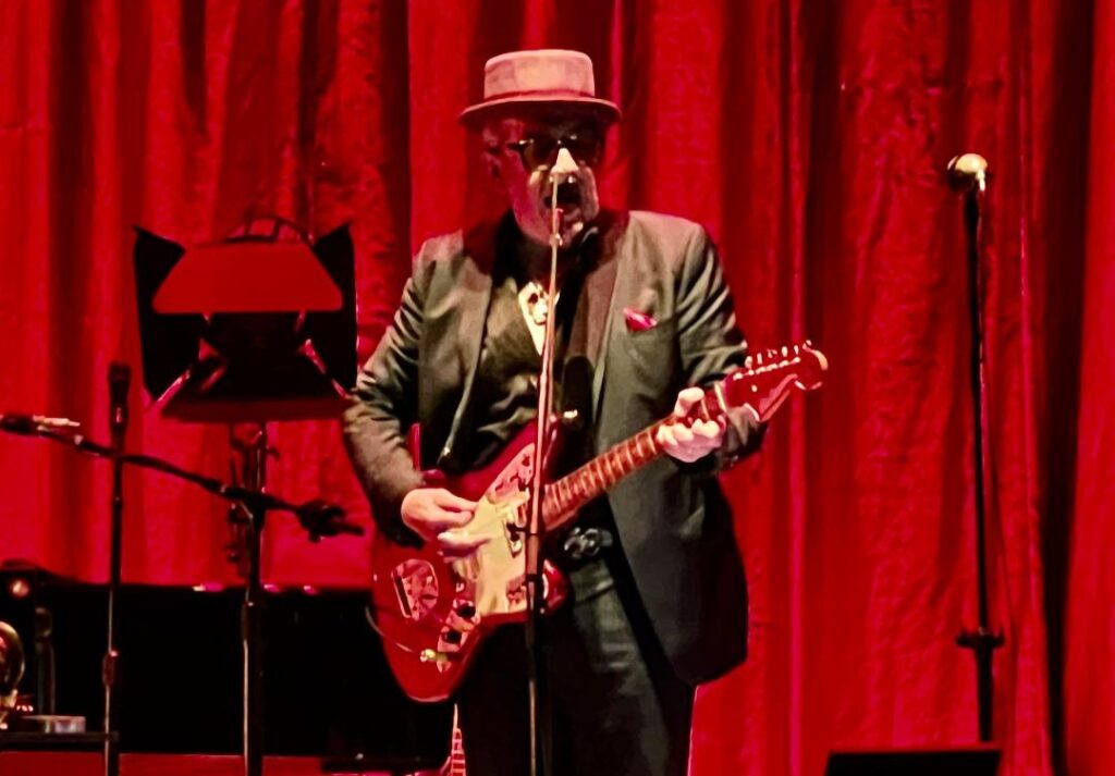 Elvis Costello Drops 52 Unreleased Tracks with “My Aim is True” 49th Anniversary Box Set Including a Gem Called “I Hear a Melody”