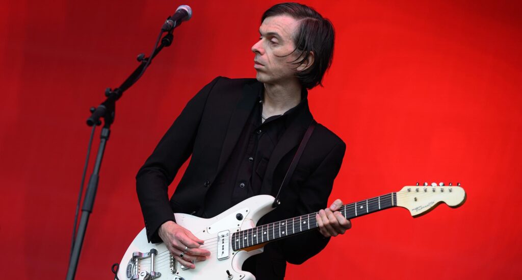 “When you stand onstage with Liam and he’s singing those songs, it’s incredible… He brought the vibe in bucketloads”: Barrie Cadogan on Liam Gallagher, Morrissey, and Primal Scream – and how John Squire started it all