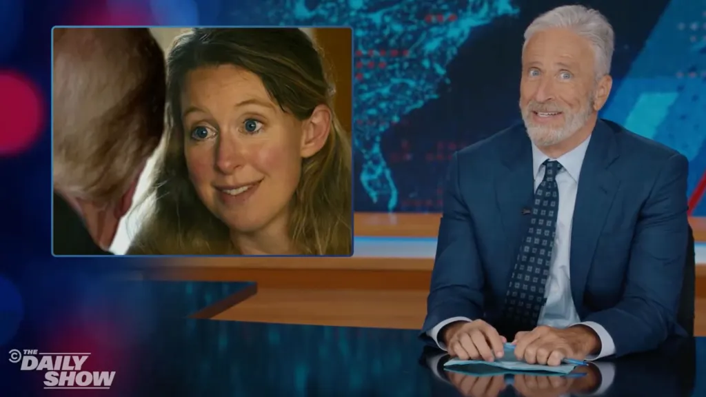 Jon Stewart Likens Donald Trump Aide Natalie Harp To Elizabeth Holmes In Viral ‘You Can See Everything’ Trailer
