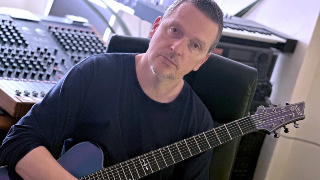 “The day I was meant to leave, I was lying in my bed, paralyzed. I was like, ‘If I’ve got to keep doing these tours, I’m going to end up dead’”: Industrial metal pioneer Justin Broadrick on his punk salvation, Phoebe Bridgers collabs and burying Godflesh
