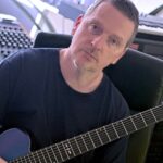 “The day I was meant to leave, I was lying in my bed, paralyzed. I was like, ‘If I’ve got to keep doing these tours, I’m going to end up dead’”: Industrial metal pioneer Justin Broadrick on his punk salvation, Phoebe Bridgers collabs and burying Godflesh