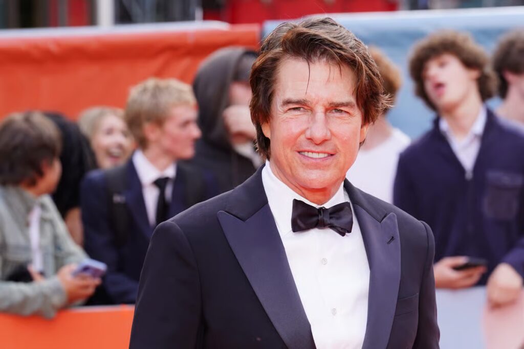 Tom Cruise surprises British man who raised money with extreme challenges