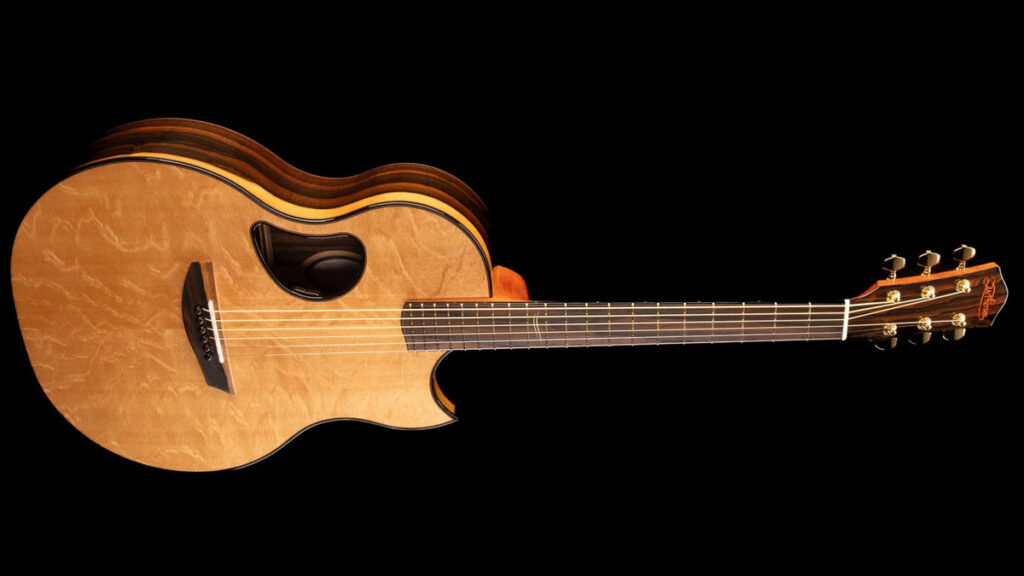 Some Builders Decided The Hole Was In The Wrong Spot: Odd Soundhole Placements On Acoustic Guitars Aren't A Mistake [News]