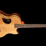 Some Builders Decided The Hole Was In The Wrong Spot: Odd Soundhole Placements On Acoustic Guitars Aren't A Mistake [News]