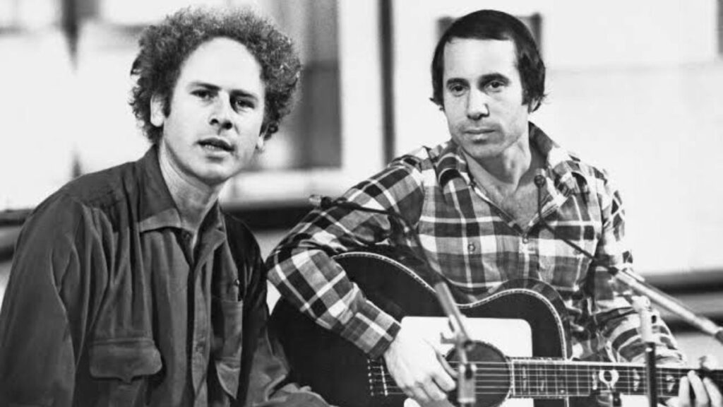 Simon & Garfunkel Had Already Split When Their Producer Secretly Added A Band To Their Song, And It Went To Number One [News]