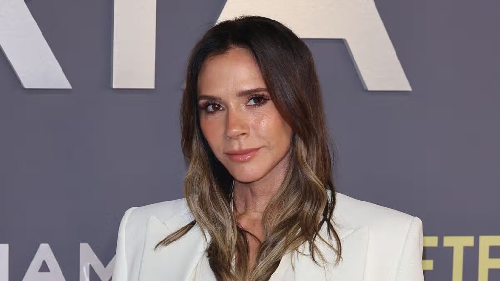 Victoria Beckham looks emotional in Paris as David sends olive branch to son Brooklyn