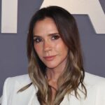 Victoria Beckham looks emotional in Paris as David sends olive branch to son Brooklyn