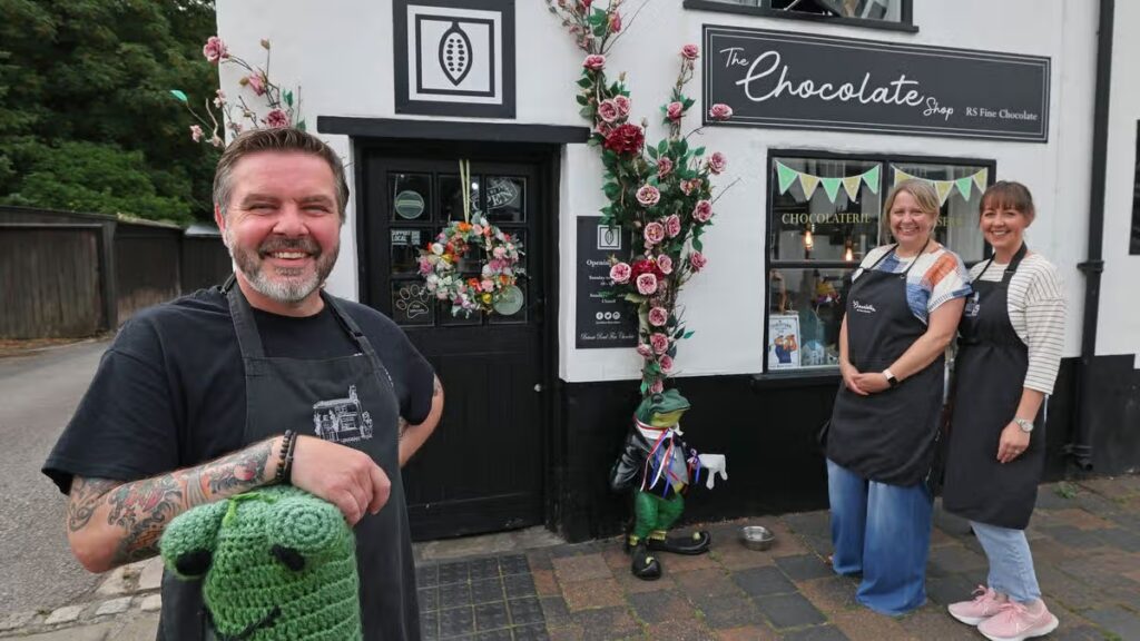 Old Merseyside village with thatched cottage shops people travel miles to visit