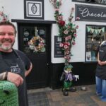 Old Merseyside village with thatched cottage shops people travel miles to visit