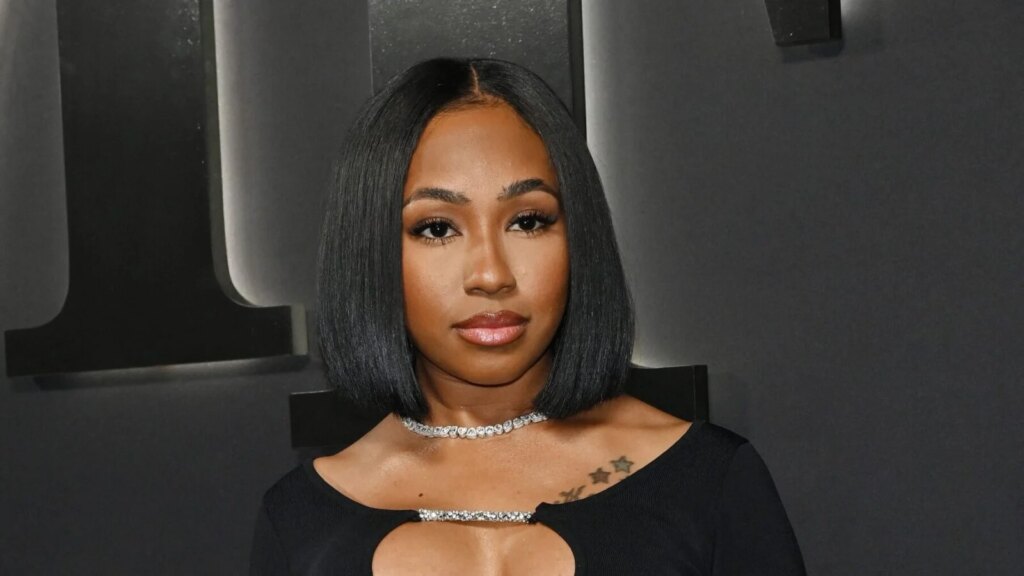 Yung Miami Drops To Low Squat In Shiny Thong, Told ‘Do Better’