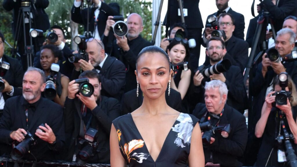 Zoe Saldana ‘Nips Out’ In Sheer PFW Dress Tagged ‘Desperate’