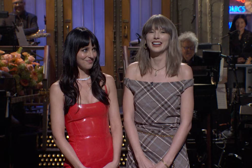 Taylor Swift makes surprise Saturday Night Live cameo as Dakota Johnson jokes about break-ups