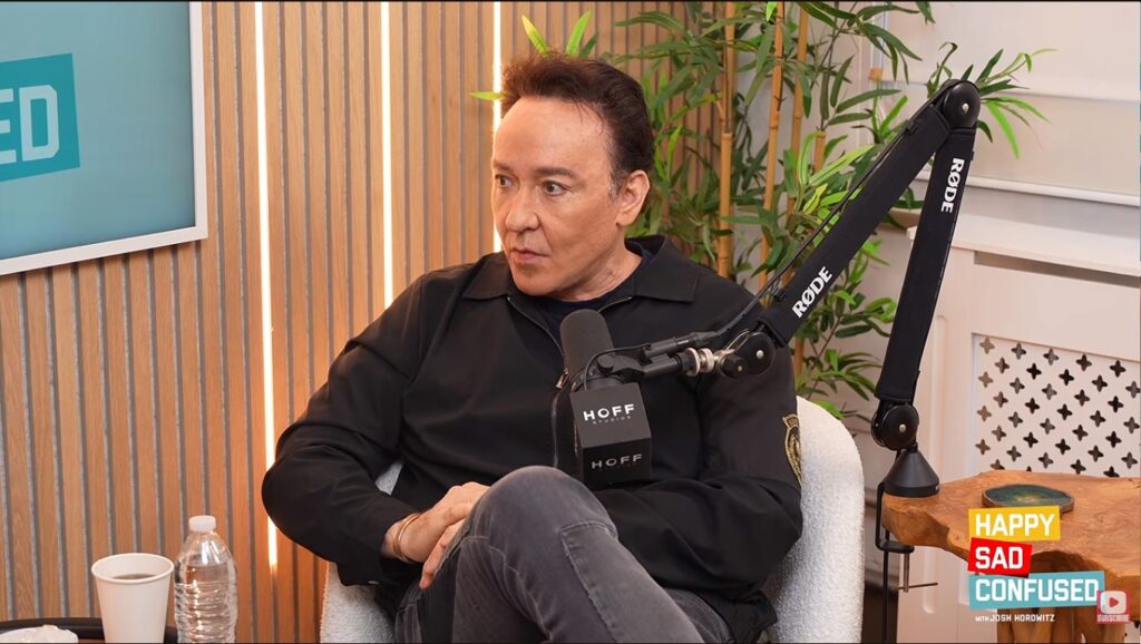 John Cusack’s appearance on ‘Happy Sad Confused’ sparked ‘plastic surgery rumors’
